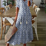 Birutė - Boho Stiliaus Moteriška Maxi Suknelė su V-kaklu ir Grafiniu Raštu