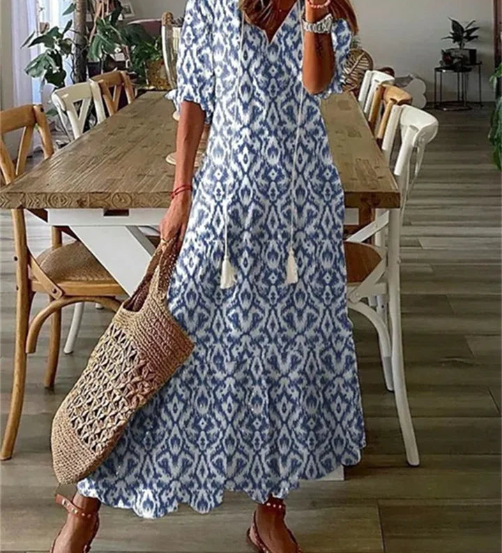 Birutė - Boho Stiliaus Moteriška Maxi Suknelė su V-kaklu ir Grafiniu Raštu