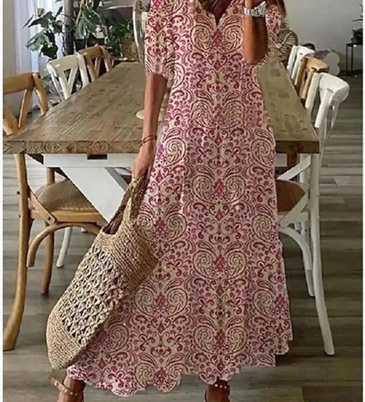 Birutė - Boho Stiliaus Moteriška Maxi Suknelė su V-kaklu ir Grafiniu Raštu